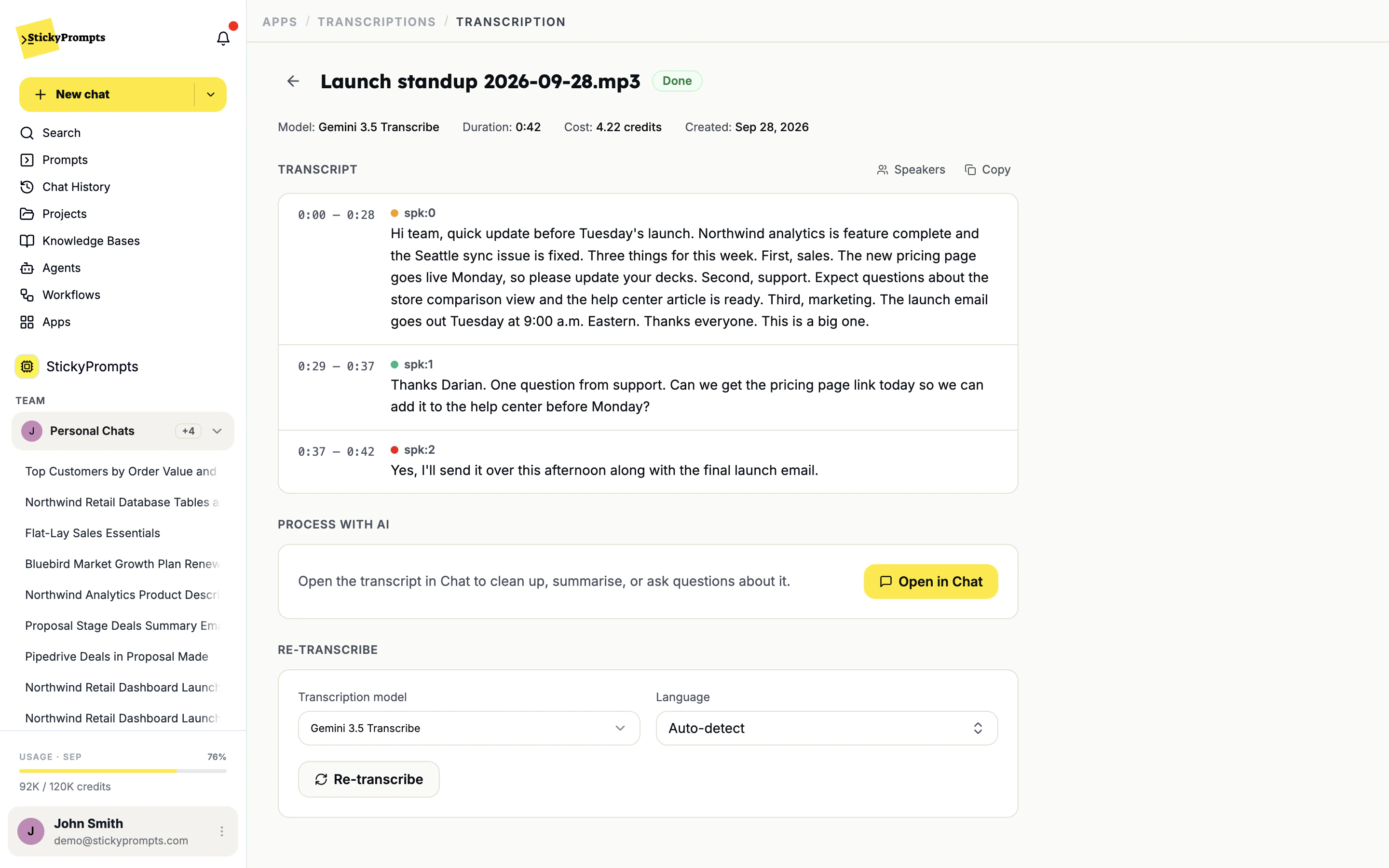 A finished transcript of Launch standup 2026-09-28.mp3 split into three speakers with timestamps, Open in Chat, and Re-transcribe